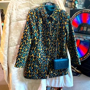 Leopard,turquoise with a gold background. A long topper jacket/ boyfriend style.